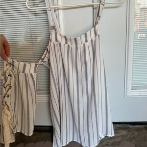 Gimmicks by BKE cold shoulder attached laced up top